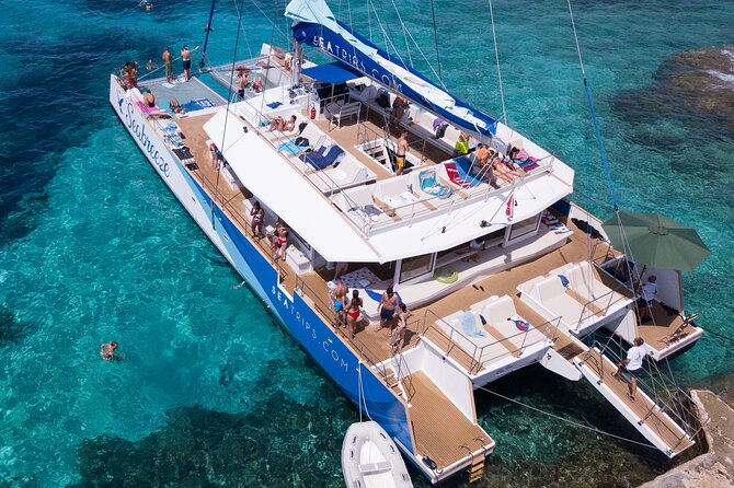 Blue Lagoon, Beaches and Bays Catamaran Sailing Tour - Crystal Lagoon: Deeper Water and Cave-Friendly Swimming