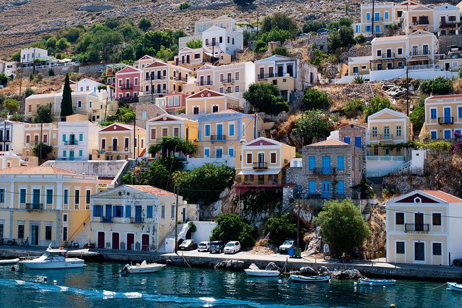 Boat Trip to Symi Island with swimming stop at St George Bay - Meeting point in Rhodes and hotel pickup reality