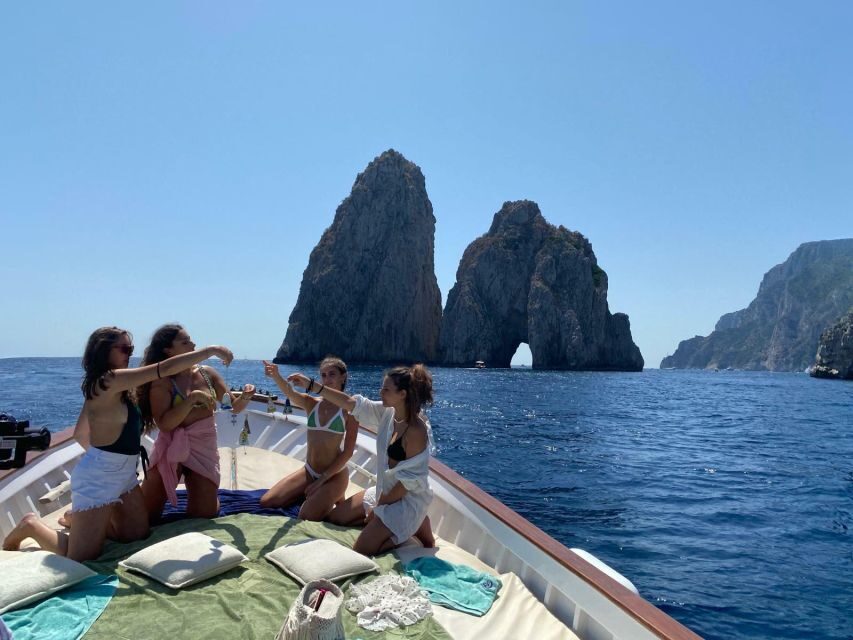 Capri: Island and Grottos Boat Cruise with Snacks and Drinks - Punta Carena Lighthouse and the Faraglioni: Capri’s Defining Sea Stacks