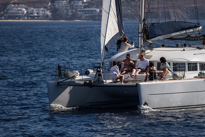 Catamaran Day & Sunset Cruises with meals Drinks and transportation - Rhenia swim and snorkel stop: 2 hours that actually matter