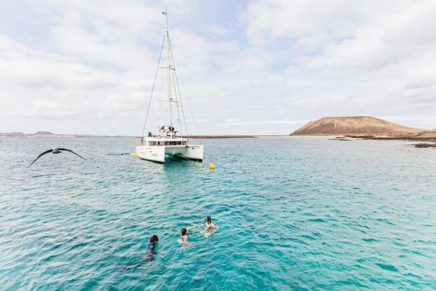 Corralejo: Lobos Island Catamaran Tour with Drinks & Snorkel - Snorkeling, Kayaking, and Paddleboarding: How the Water Time Feels