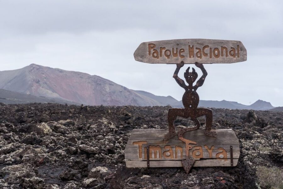 From Fuerteventura: Lanzarote Volcano and Wine Region Tour - La Geria wine country: circular vineyards and black ash