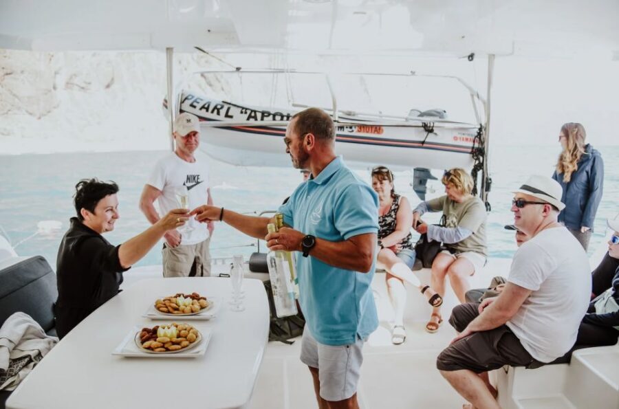 Funchal Bay: Dolphin & Whale Watch Luxury Catamaran Cruise - Cabo Girão: the swim/snorkel break that makes the cruise feel special