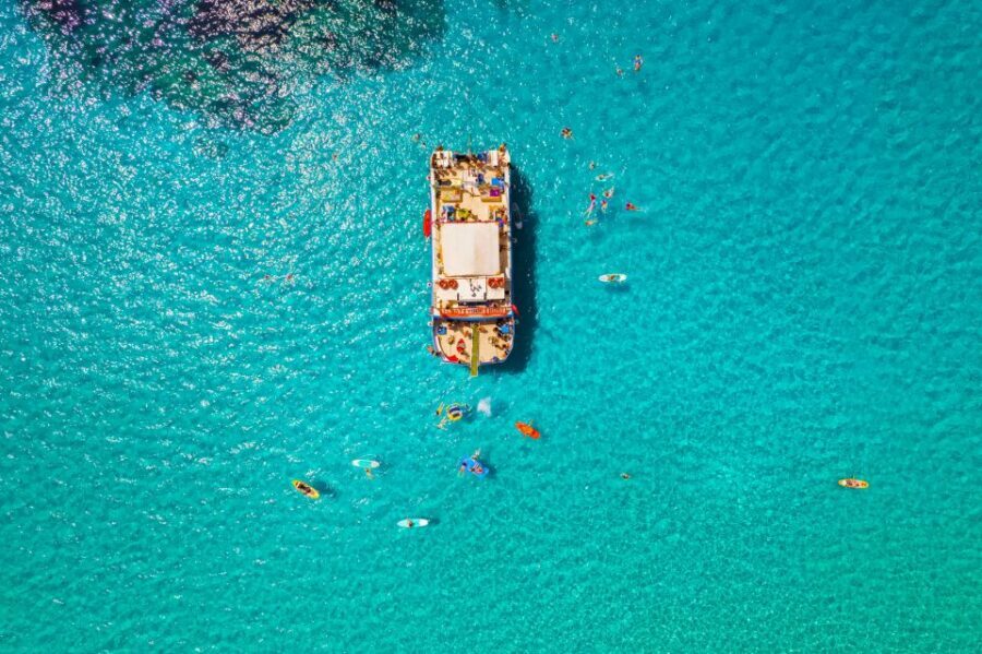 Ibiza: Beach Hopping Cruise w/ Paddleboard, Food, & Drinks - Crew and Safety: Helpful Lifeguard Energy Without Killing the Fun