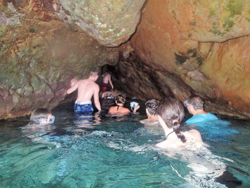 Ibiza: Snorkeling and SUP Paddle, Beach and Cave Boat Tour - Stop Two: Cala Bassa for Turquoise Water and Soft-Sand Time