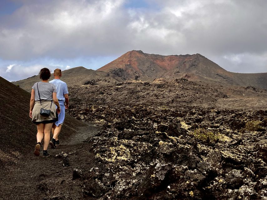 Lanzarote: Hike Across Timanfaya's Volcanic Landscapes - Crossing lava fields and checking craters up close