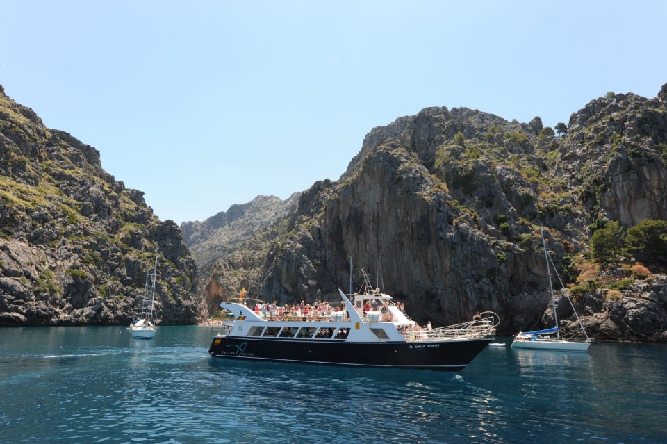 Mallorca: Island Trip by Train, Tramway, and Boat - Tram to Port de Sóller: your beach and food landing spot