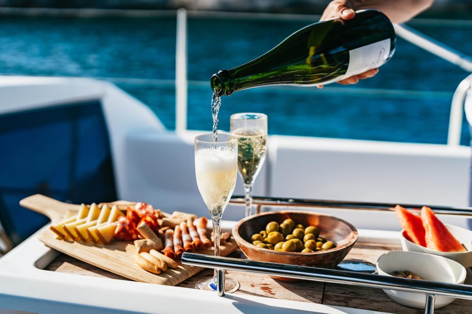 Mallorca: Midday or Sunset Sailing with Snacks and Open Bar - Palma Bay sailing: city views, photo moments, and when it’s still “sailing”