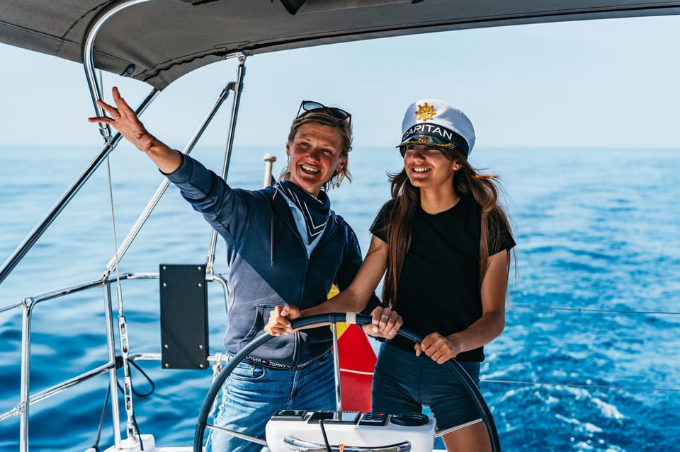 Mallorca: Midday or Sunset Sailing with Snacks and Open Bar - The secret stop: swim platform, snorkeling gear, and marine-life luck