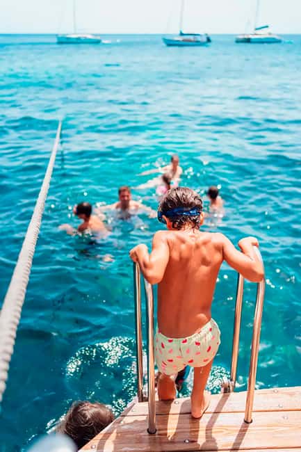 Menorca: Natural Coves and Beaches Boat Trip & Paella Lunch - Macarelleta and the coves ride: the in-between scenery you’ll remember