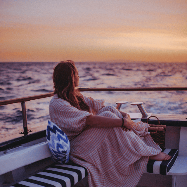 Palma Bay: Boat Tour with BBQ, Snorkelling, & Sunset Option - Crew energy, music, and photos: fun with a small volume note