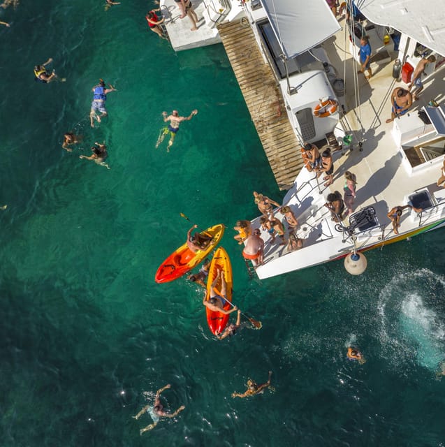 Port d'Alcudia: North Coast Catamaran Cruise with Meal - The Swim Stops: Quiet Coves, Clear Water, and All the On-Boat Toys