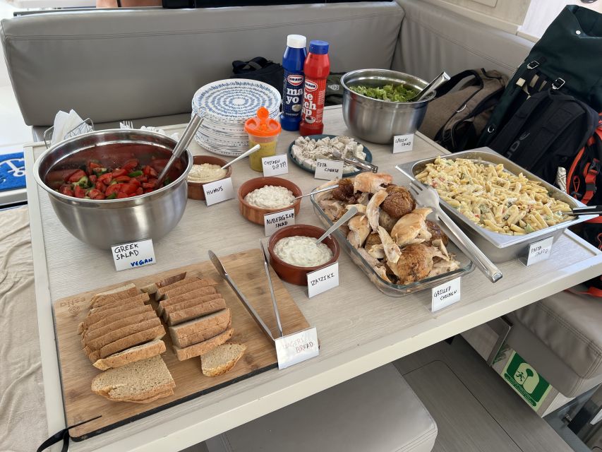 Rhodes: All-Inclusive Catamaran Cruise with Lunch and Drinks - Afandou Beach and caves (power option): more scenery, more water time
