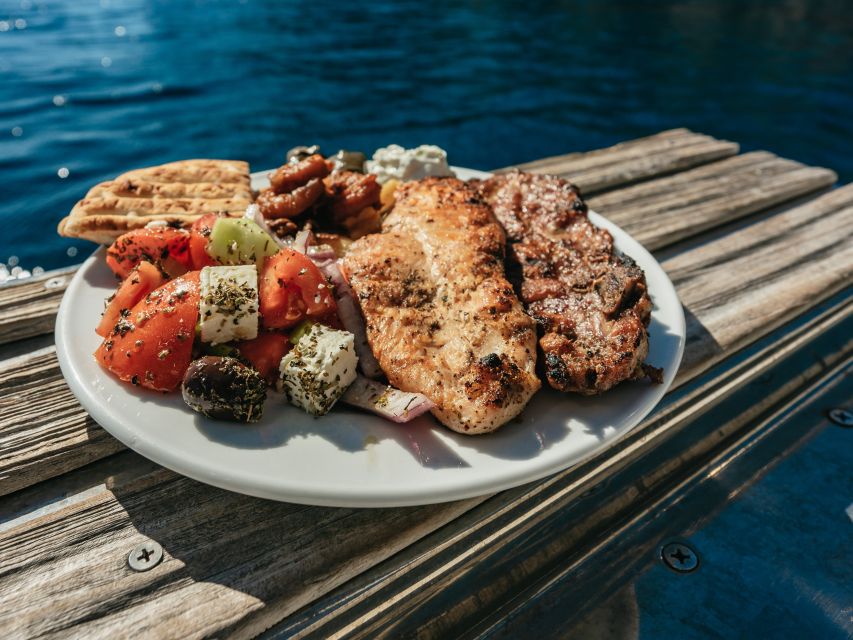 Santorini: Catamaran Caldera Cruise with Meal and Drinks - Why a Santorini catamaran feels different from island tours