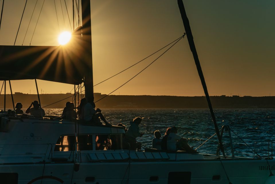 Santorini: Catamaran Caldera Cruise with Meal and Drinks - Crew energy, service, and small comfort wins