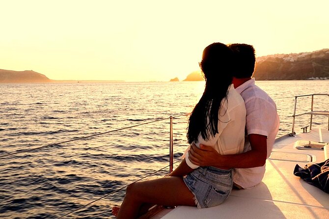 Santorini Catamaran Cruise with Greek Meal, Open-Bar and Sunset - Caldera Views Plus a Small-Boat Atmosphere