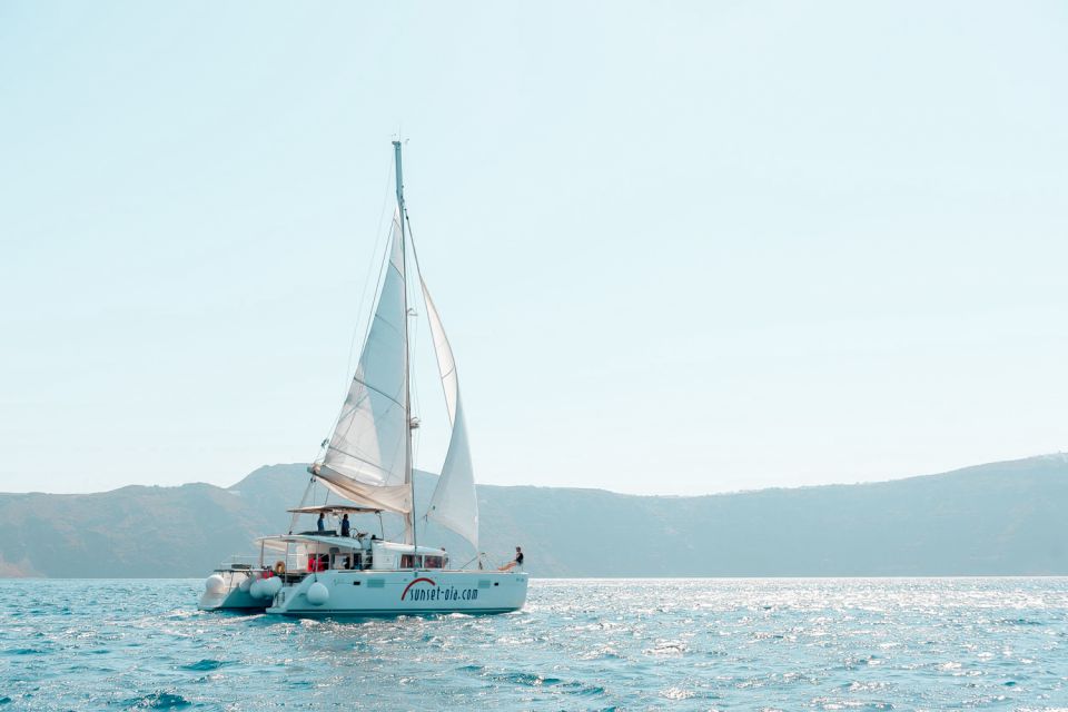 Santorini: Catamaran Tour with BBQ Meal and Unlimited Drinks - Weather, Motion Sickness, and What to Pack for Real Comfort