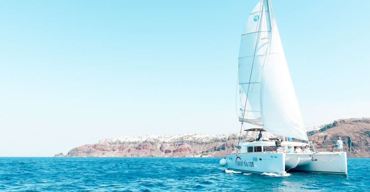 Santorini: Catamaran Tour with BBQ Meal and Unlimited Drinks - Hot Springs in the Caldera: Nea Kameni Swim Time