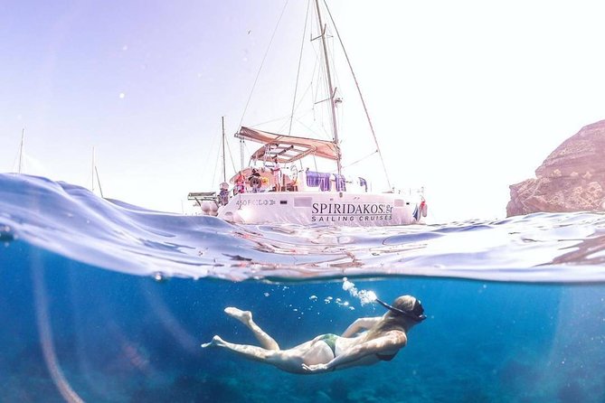 Santorini Classic Catamaran Cruise with BBQ, Drinks and Transfers - The Big Swim Stop at Mesa Pigadia: Where Snorkeling Feels Worth It