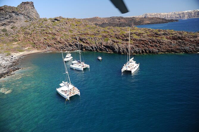 Santorini Classic Catamaran Cruise with BBQ, Drinks and Transfers - Palea Kameni Hot Springs: Warm Water, Sulfur Water, and a Real Swim Requirement