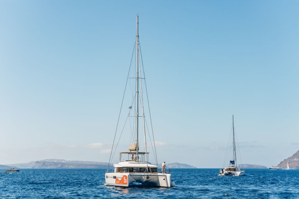 Santorini: Luxury Catamaran Day Trip with Meal and Open Bar - Key highlights to know before you go