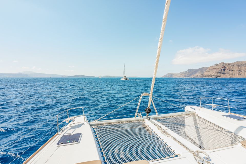 Santorini: Luxury Catamaran Day Trip with Meal and Open Bar - Luxury catamaran time: why this is a smart Santorini day