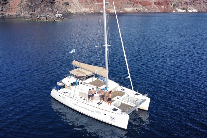 Santorini Platinum Catamaran Cruise with Meal, BBQ and Open Bar - Getting to the port: pickup is offered, but don’t rely on luck