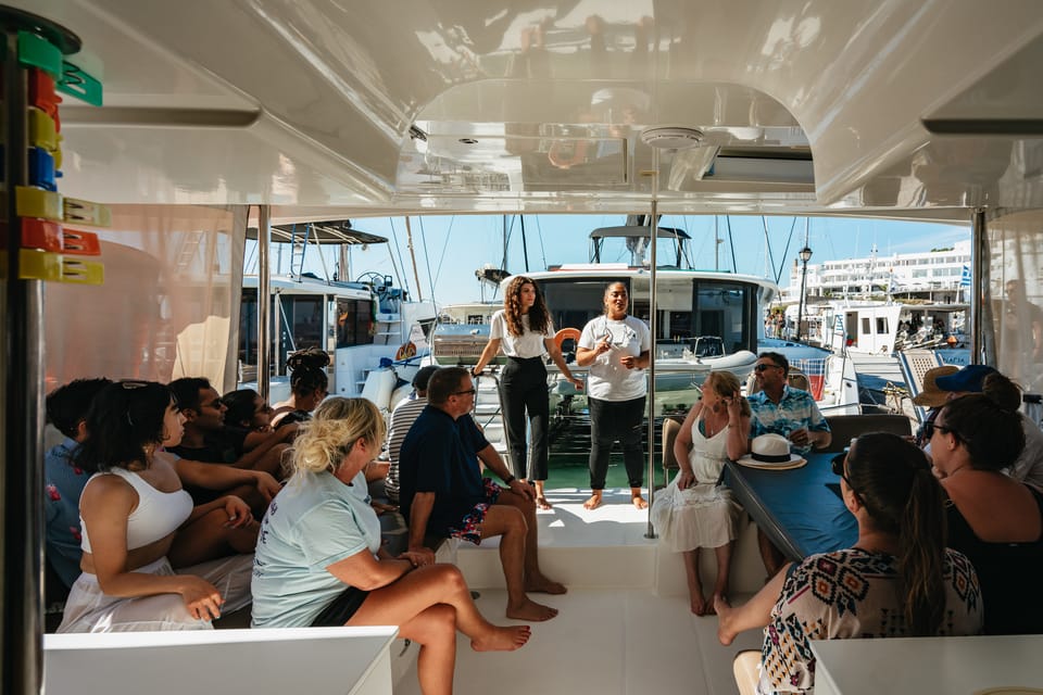 Santorini: Sailing Catamaran Cruise with BBQ and Drinks - White Beach and Akrotiri Lighthouse: short stops with big photo value