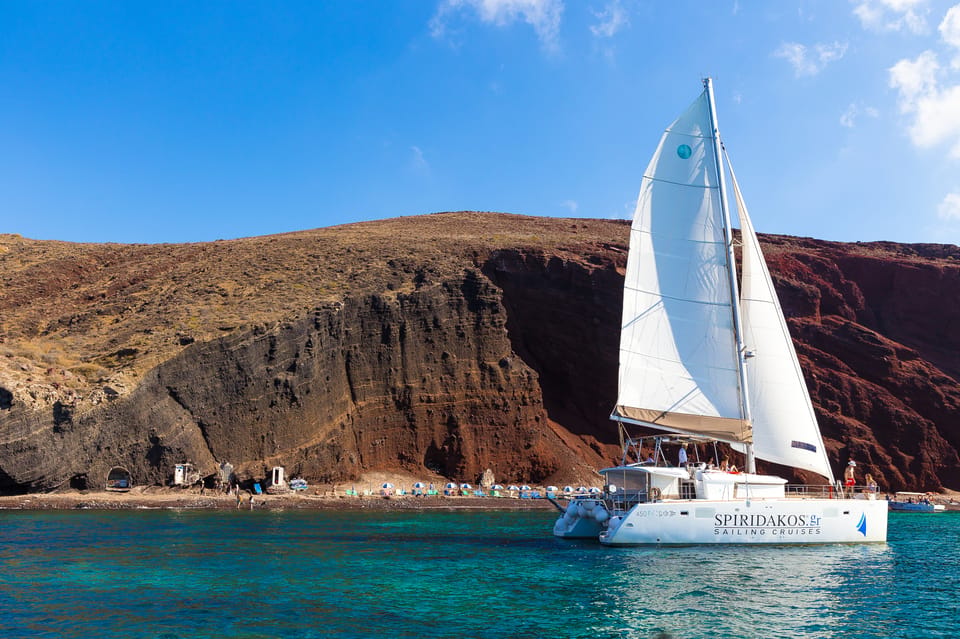 Santorini: Sailing Catamaran Cruise with BBQ and Drinks - Getting on board: comfort, layout, and practical perks