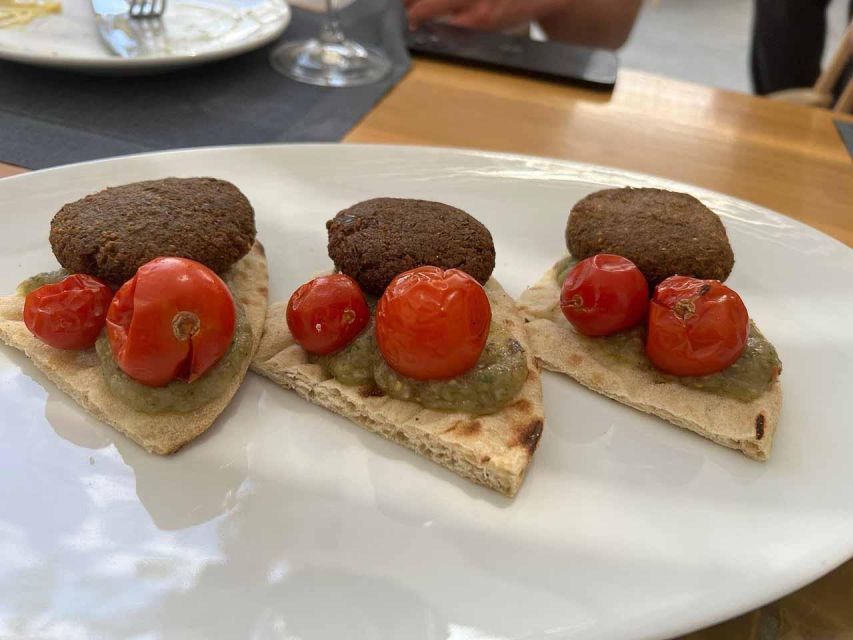 Santorini: Small-Group Sunset Wine Tour with Santo Winery - Food pairing on the tour: enough to keep you enjoying the pours