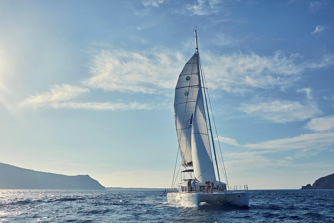 Santorini Sunset Luxury Sailing Catamaran Cruise with BBQ, drinks, transfer - Caldera Route: Sail Next to Palea Kameni and the Volcano