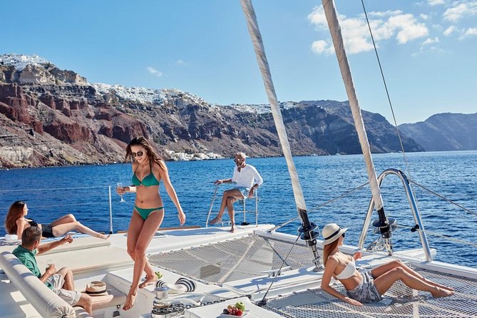 Santorini Sunset Luxury Sailing Catamaran Cruise with BBQ, drinks, transfer - Inside a Luxury Catamaran (Max 20): Comfort, Space, and Practical Rules