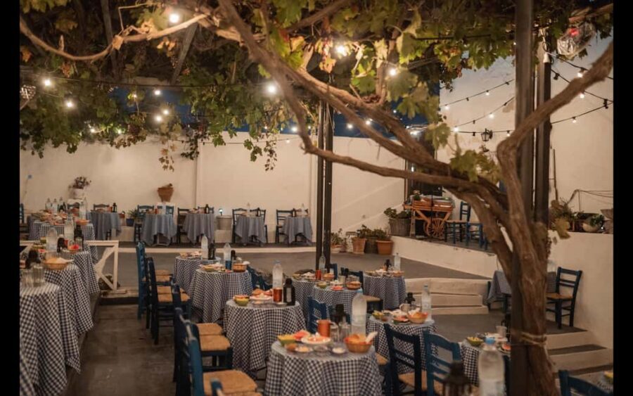 Santorini: The Greek Wedding Show Entry Tickets - Outdoor patio party: Zorba, Syrtaki, and the crowd participation rhythm