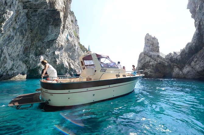 Small Group Capri Island Boat Ride with Swimming and Limoncello - East-coast views: Arco Naturale and Villa Malaparte from the water