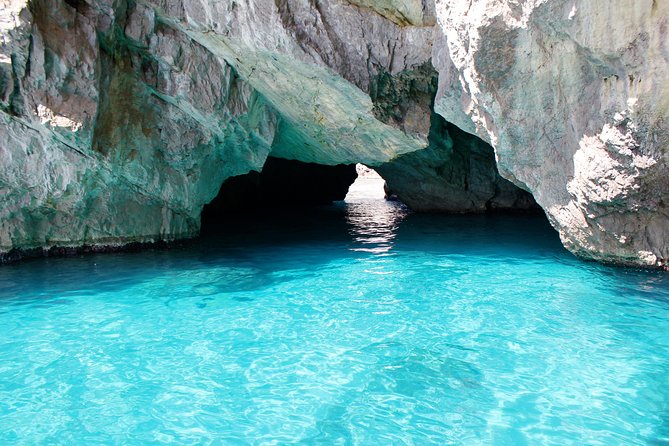 Small Group Capri Island Boat Ride with Swimming and Limoncello - I Faraglioni sea stacks: the postcard stop plus real swim time