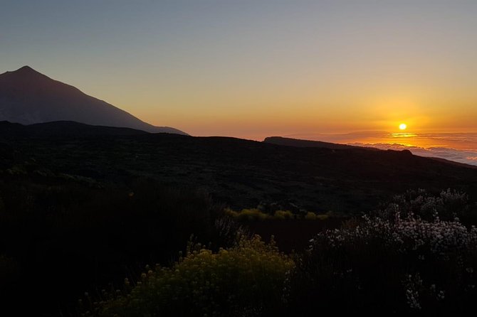 Teide by Night: Sunset & Stargazing with Telescopes Experience - Sunset over the clouds: the moment that sells the trip