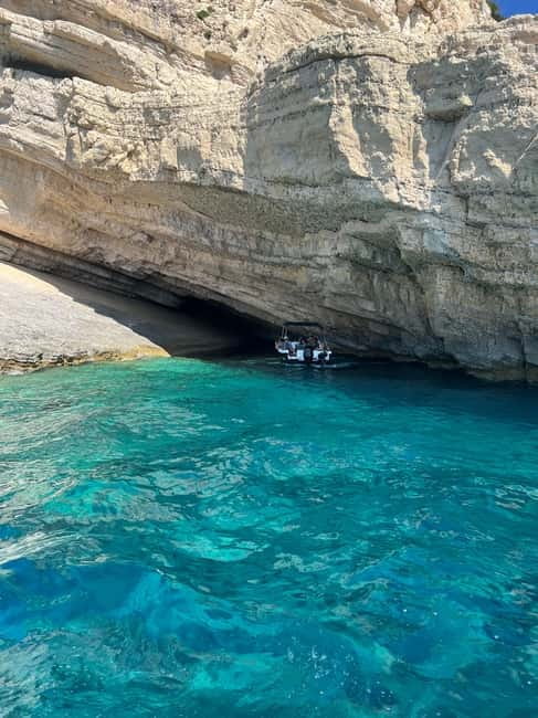 Zakynthos: Turtles, Marathonisi & Keri Caves Speedboat Tour - Pickup, Agios Sostis Harbor, and what the day feels like in practice